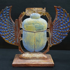 The Enigmatic Dualism of the Double-Faced Scarab: Symbol of Life and Afterlife