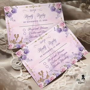 May include: Two RSVP cards with a soft pink background, adorned with purple and pink roses. The cards feature gold accents, a castle silhouette, and the text "Kindly Replay BY NOVEMBER 10, 2026". They include options to accept or decline.