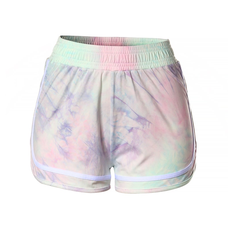 May include: Tie-dye print shorts with a white trim around the waistband and legs. The shorts are made of a soft, comfortable fabric and have an elastic waistband.