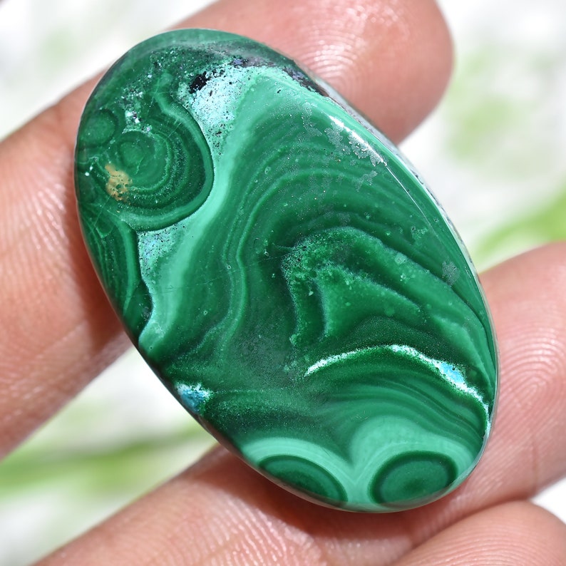 oval malachite"
2. "cabochon stone"
3. "AAA malachite"
4. "jewelry making"