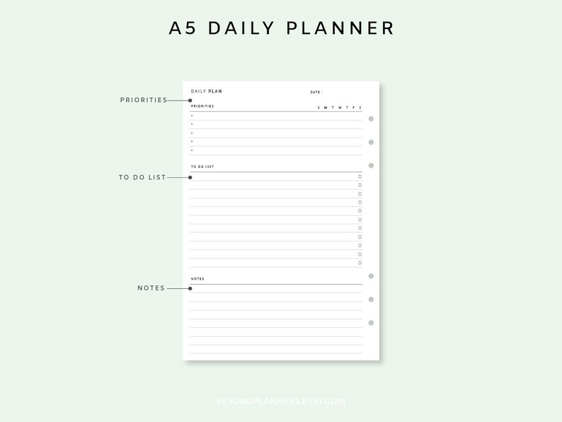 May include: A5 daily planner printable with sections for priorities, to do list, and notes. The planner has a simple design with black text and lines on a white background.