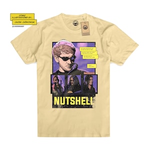 May include: A yellow t-shirt featuring a comic book style illustration of a band called "Nutshell". The illustration depicts a singer with a microphone and three other band members. The text "We chase wonders, lose our way, we're all just a little off, I try to keep my head up, but I'm always on the run, no one to go to, no place to call home." is included in the illustration.