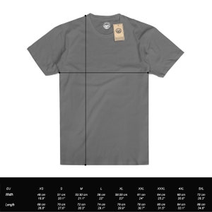 May include: A size chart for a gray t-shirt with measurements in inches and centimeters. The chart shows the width and length of the shirt in different sizes, from XS to 5XL.