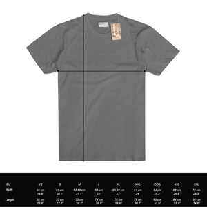 May include: A grey t-shirt with a crew neck and short sleeves. The t-shirt is laid flat and a size chart is shown below the t-shirt. The size chart shows the measurements in centimetres and inches for sizes XS to 5XL.