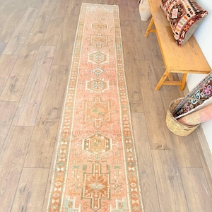 Vintage Oushak Rug: Hand-Knotted Wool, Floral Faded Design (10.7 x 2 ft.)