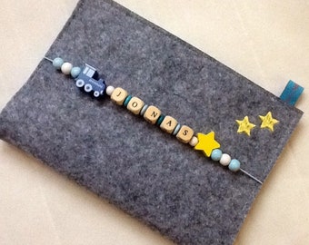 Personalized felt U-bookcase with vaccination card compartment