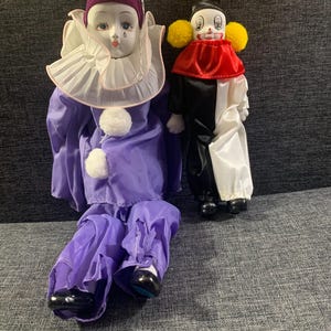 2 vintage Pierrot clown dolls, 1980s; ceramic heads, hands & feet. 1 purple, 16&quot;/1 B and W, 9&quot;. Excellent cond. Gifts for clown collectors