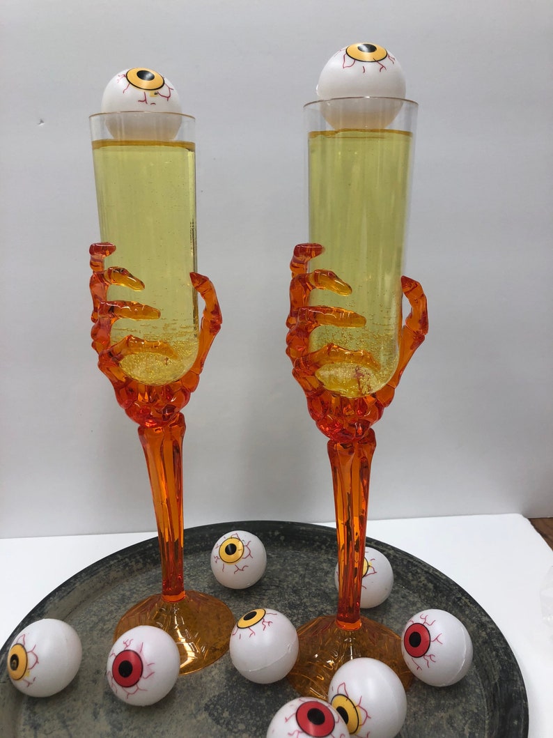 Halloween Drink in a spooky plastic glass. Etsy