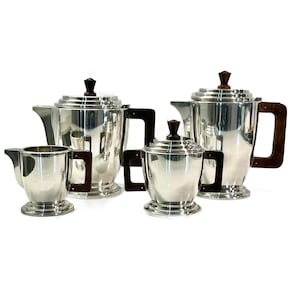 French Art Deco Silver Plate Coffee and Tea Set: Walnut Handles, 1920s