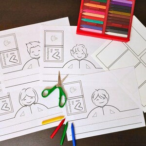 May include: A set of printable paper crowns featuring children holding books with the text "I love the Scriptures". The crowns are designed for coloring and cutting out. The image also includes a set of colored pencils and a pair of scissors.