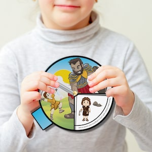 Puede incluir: Una ruleta giratoria ilustrada y colorida con una escena de David y Goliat. La ruleta tiene un fondo azul, verde y marrón con un sol amarillo. El texto en la ruleta dice "David mató a Goliat con una honda y una piedra".