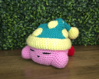 Pelúcia de crochê do Kirby dormindo