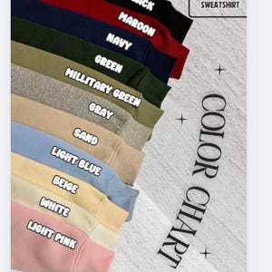 May include: A colour chart showing adult hoodie and sweatshirt colours. The colours include black, maroon, navy, green, military green, grey, sand, light blue, beige, white, and light pink. The text "COLOUR CHART" is also visible.