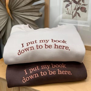 Embroidered I Put My Book Down To Be Here Sweatshirt, Custom Embroidered Sweatshirt, Gift For Book Lover, Birthday gift ,Book Lover Shirt