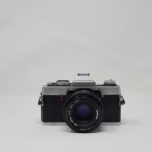 Vintage Mint Condition Minolta XG-1 35mm SLR Film Camera Body and Sharp 50mm f/2 Lens Tested Works