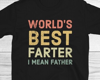 Puede incluir: Camiseta negra con un gráfico de estilo vintage que dice "World's Best Farter I Mean Father".