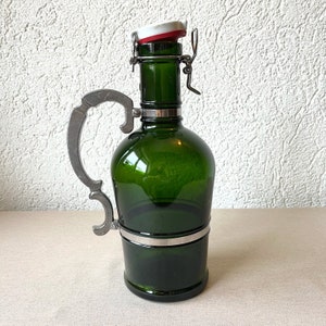 Decorative green glass bottle with metal handle Licher vintage Germany
