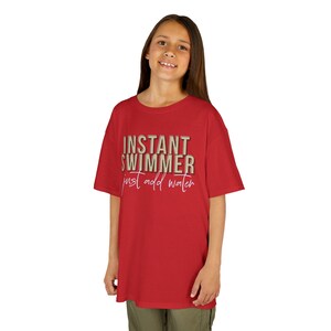 back of swim team Instant Swimmer Just Add Water t-shirt in color navy