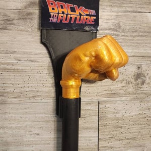 Back to the future Biff Tannen cane fist bttf prop with display hanger!