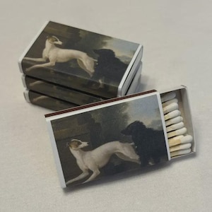 May include: A set of three ceramic mugs with a speckled, matte finish. The mugs are in shades of cream, light gray, and dark gray. Each mug has a simple, minimalist design, perfect for coffee or tea.