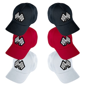 May include: Set of three baseball caps with a checkered flag design. The caps are navy blue, red, and white.