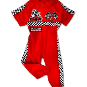 Toddler and kids race car jumpsuit costume – bright red outfit with embroidered patches, racing flags, and elastic cuffs. Matching cap included. Back can be personalized with a name and number. Great for birthday celebrations, photo props, and cosplay fun.