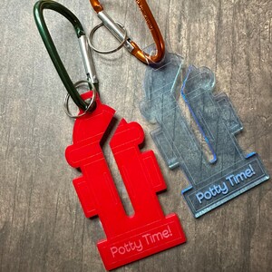 Dog poop bag carrier, Hydrant, Gift Bag, stocking stuffer, clip color may vary.