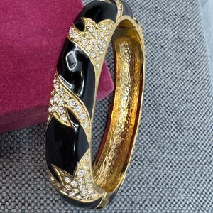 Vintage Napier Runway Book Piece from the &quot;Pave Collection&quot; Black Enamel, Rhinestone Pave, Gold Tone Bangle Bracelet, c. 1980s