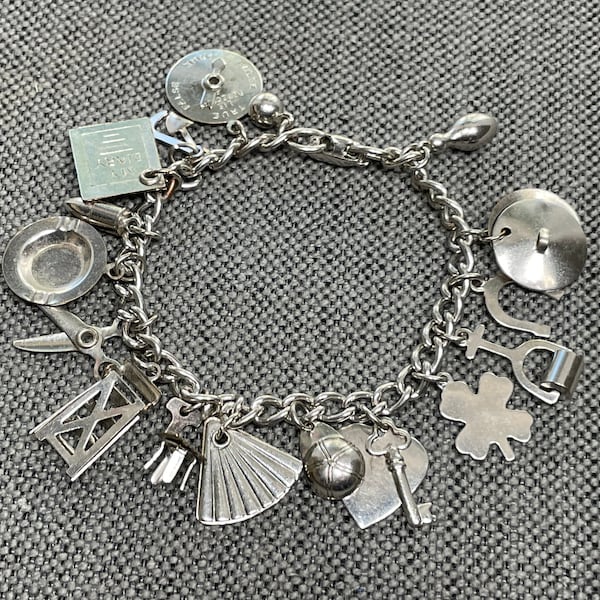 Vintage Coro Charm Bracelet Silver Tone 7”, Fifteen Charms Horseshoe, Clover, Fan, Ladder, Diary & More! Signed Coro, c. 1960s