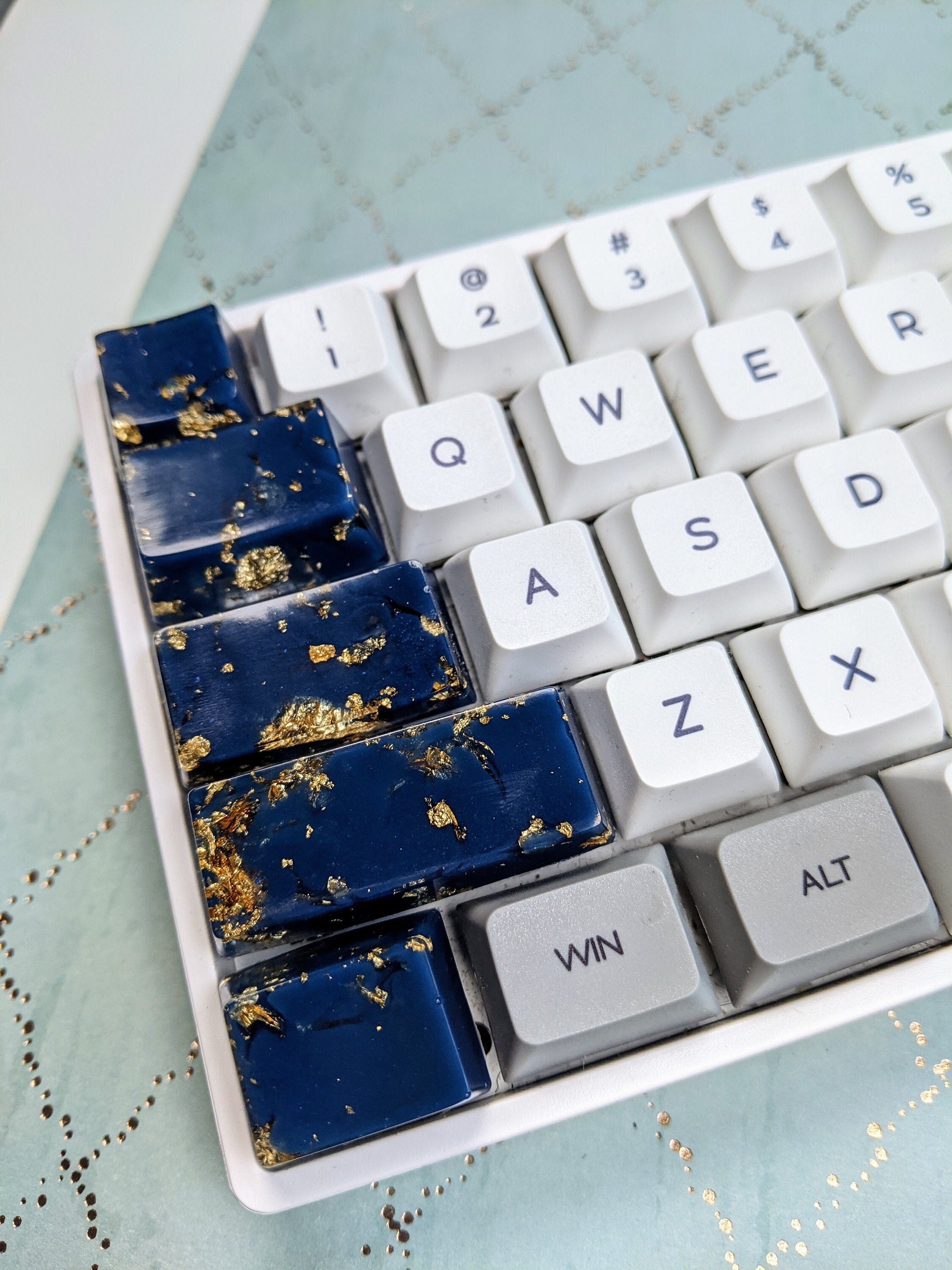 Stunning blue resin keyboard keys with handmade gold leaf. Etsy