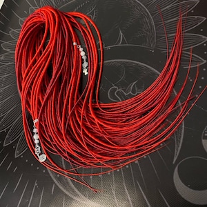 Dreadlocks sintetici rossi: extension bicolore, stile boho festival