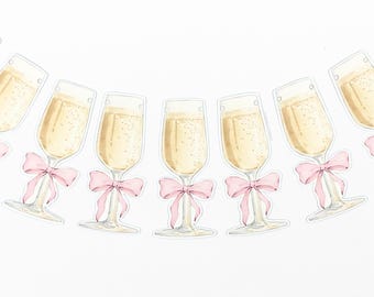 Op de afbeelding: Een guirlande van champagne glazen met roze strikken. Elk glas is gevuld met een lichtgele vloeistof. De guirlande is perfect voor een feestje of viering.
