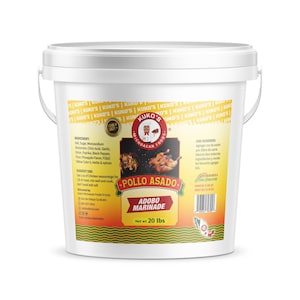 May include: A white plastic bucket with a yellow label that says "Kuko's Michoacan Foods Pollo Asado Adobo Marinade Net wt 20 lbs". The label also has a picture of a roasted chicken.