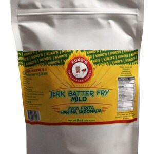 May include: A white resealable bag of Kuko's Jerk Batter Fry Mild seasoning mix. The bag is labeled with the brand name, product name, and net weight of 8 oz (226.8 grams).