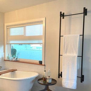 Hanging towel ladder bar