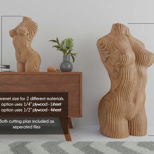 May include: Two wooden sculptures of a human torso, one 20 inches tall and the other 40 inches tall. Both sculptures are made of plywood and have a layered, textured design.