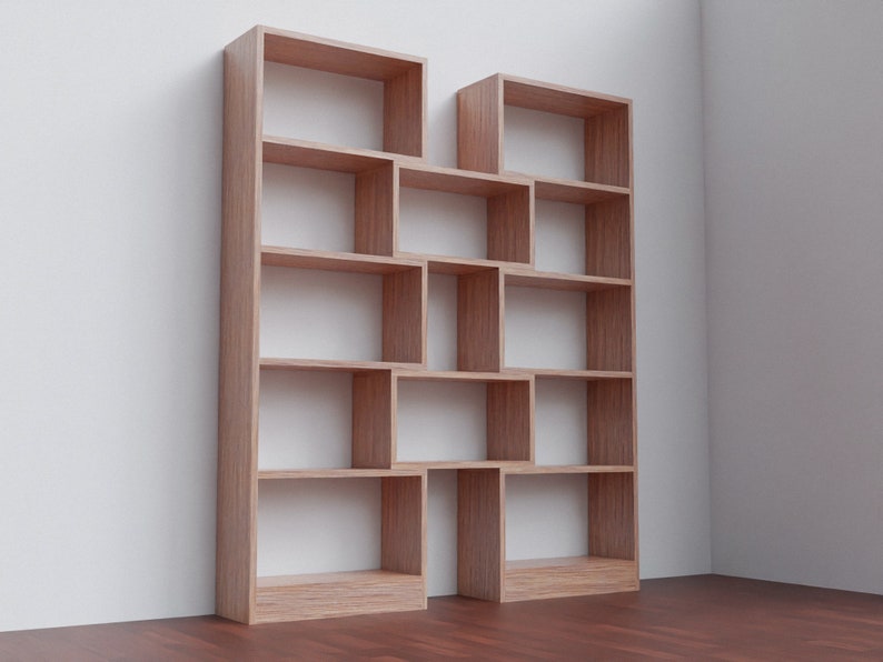 K&ouml;nnte beinhalten: Ein gro&szlig;es, h&ouml;lzernes B&uuml;cherregal mit mehreren Regalbrettern und F&auml;chern. Das B&uuml;cherregal ist aus hellbraunem Holz gefertigt und hat ein modernes Design.
