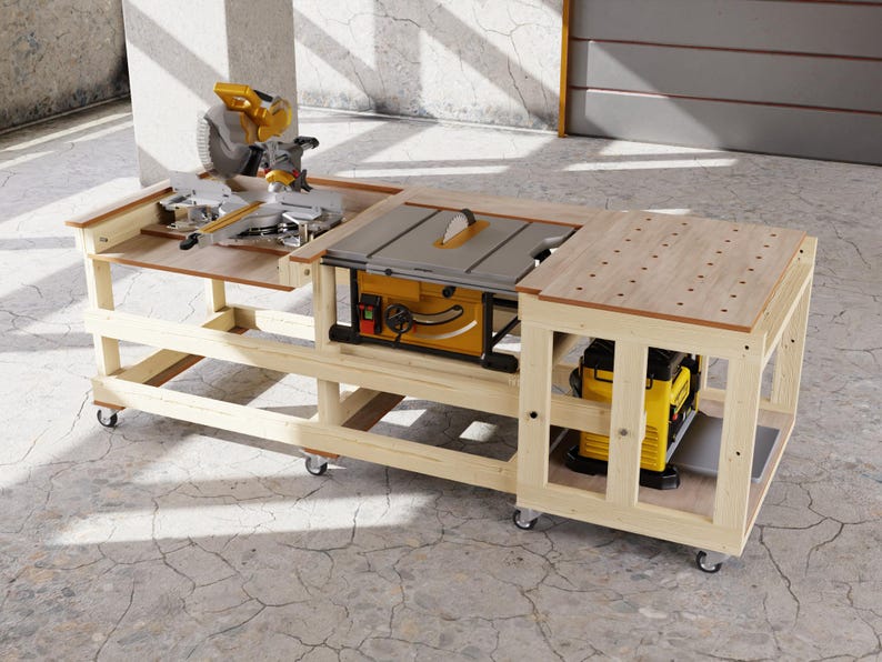 May include: A light-colored wooden workbench on casters featuring a miter saw on the left, a table saw in the center, and a perforated work surface on the right, with a yellow and black planer stored on the lower shelf of the right section.
