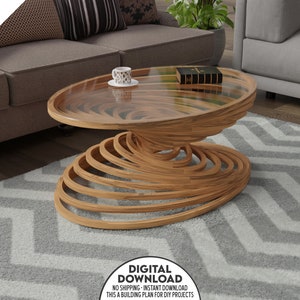 May include: A wooden coffee table with a glass top and a unique spiral design. The table is made of light brown wood and has a clear glass top. The spiral design is made of multiple layers of wood that are stacked on top of each other. The table is sitting on a grey and white chevron rug.