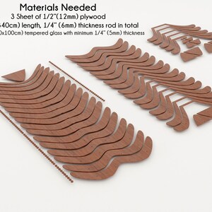 May include: A collection of wooden cutouts for a project, including curved pieces and small triangles. The image includes text indicating the materials needed: 3 sheets of 1/2" plywood, 134" length rod, and 40x40" tempered glass.
