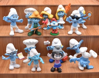 ヴィンテージ SMURFS スマーフ (ケーキを持ったスマーフ) フィギュア 
