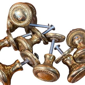 May include: A handmade wooden sign with the text "Welcome to our home" in a handwritten style. The sign is painted white with black lettering and a distressed finish, perfect for home decor.