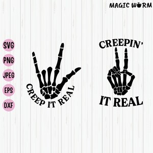 May include: Two black skeleton hands making hand gestures. The left hand is making the "I love you" sign with the text "Creep It Real" around it. The right hand is making the peace sign with the text "Creepin' It Real" above it.