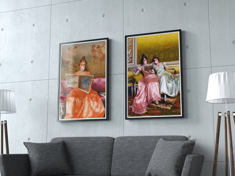 May include: Two framed paintings of women wearing face masks and sitting on a couch. The women are dressed in long, flowing gowns. The paintings are set against a neutral background.