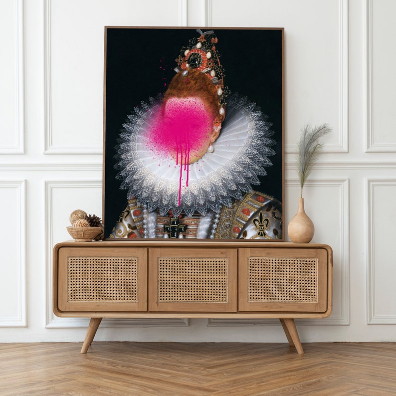May include: A painting of a woman wearing a white lace collar and a crown. Her face is covered in pink paint with drips running down her neck.