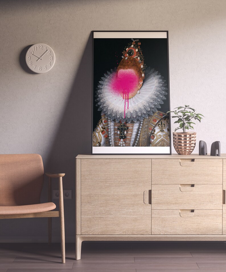 May include: A framed portrait of a woman wearing a white lace collar and a gold and red dress. Her face is obscured by a pink spray paint splatter.