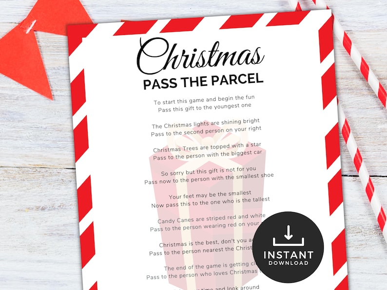 May include: A printable Christmas game instruction sheet with red and white stripes on the border. The text reads "Christmas Pass the Parcel" and includes instructions for a Christmas party game.
