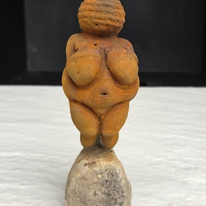 Venus of Willendorf Goddess Statue on natural stone stand