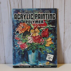 May include: A vintage book titled "A Fun Book on Acrylic Painting Polymer" by Arden von Dewitz. The cover features a colorful painting of a bouquet of flowers in a blue vase against a blue background. The book is published by Walter T. Foster.