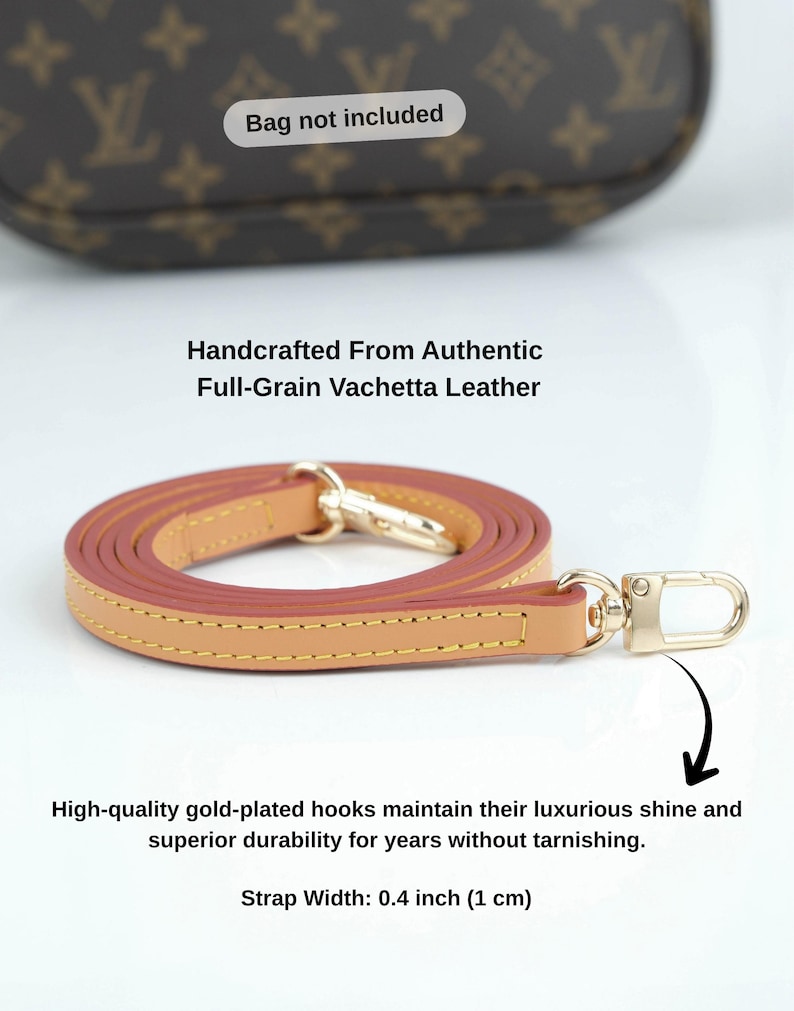 May include: A tan and pink leather purse strap with gold-plated hooks. The strap is 0.4 inches (1 cm) wide and made from full-grain Vachetta leather. The image includes the text: "Bag not included."